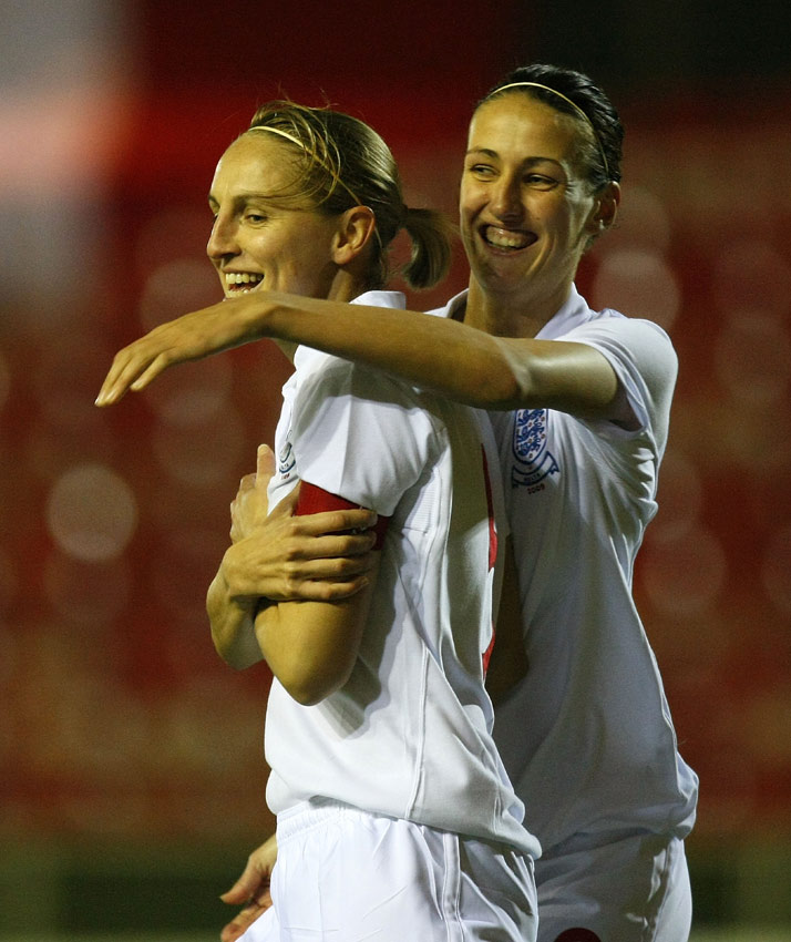 England's Faye White (l) and Jill Scott celebrate a goal.